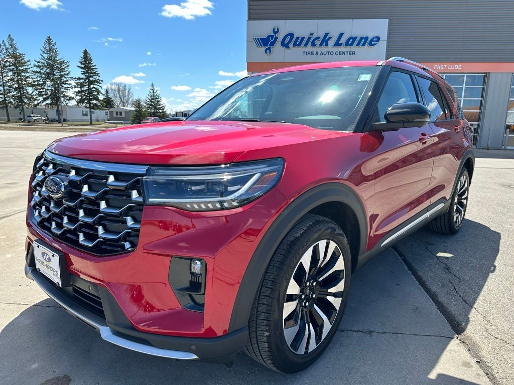 2026 Ford Explorer Platinum in Rapid Red Metallic Tinted Clearcoat — front three-quarter view