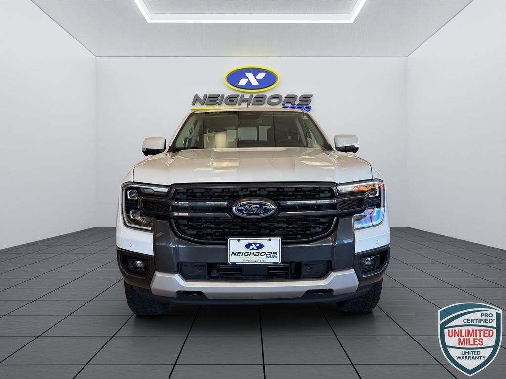 2025 Ford Ranger Lariat in Oxford White — front three-quarter view