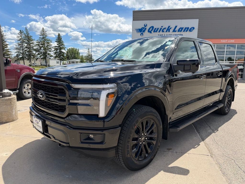 2026 Ford F-150 Lariat in Agate Black Metallic — front three-quarter view